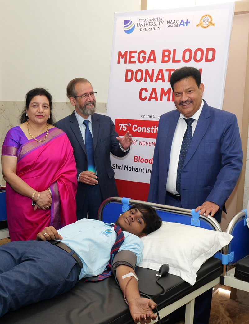 Uttaranchal University Blood Donation Camp with university officials and student donor